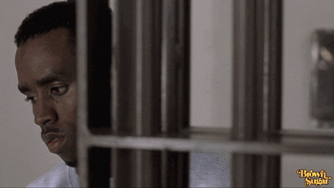 Man In Jail Cell With Brown Sugar Logo GIF