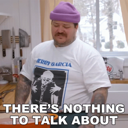 Man in Jerry Garcia T-Shirt in Kitchen