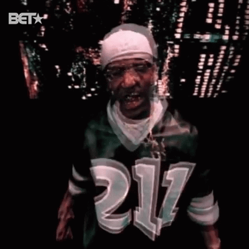 Man In Jersey 211 On Night Street GIF
