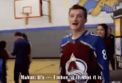 Man in Jersey Number 8 at Basketball Hoop