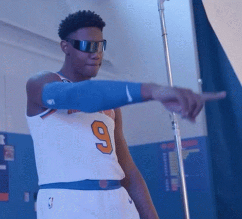 Man In Jersey Number 9 And Sunglasses GIF