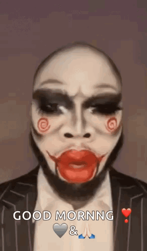 Man in Jigsaw Puppet Makeup Says Good Morning
