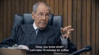Man In Judge's Robe Talking GIF