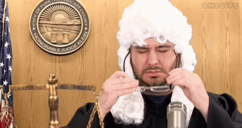 Man In Judge Wig Holding Glasses GIF