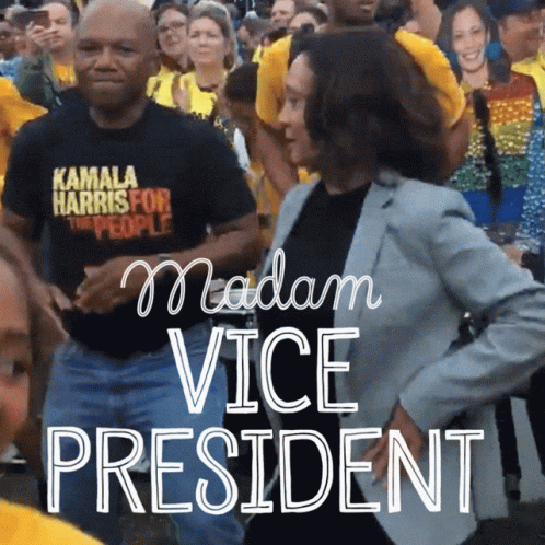 Man in Kamala Harris for the People Shirt Dancing With Woman