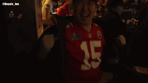 Man in KC Hat and Jersey Number 45
