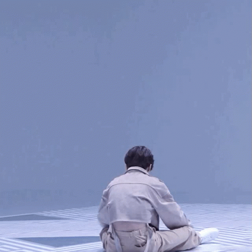Man In Khaki Pants And Tan Jacket Dancing GIF