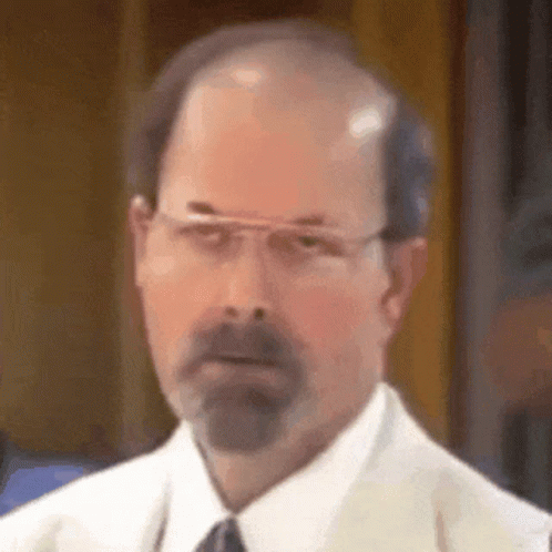 Man In Kimono Sitting At Table With Food GIF