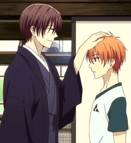 Man In Kimono Touches Head Of Man In White Shirt GIF