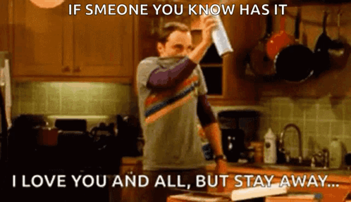 Man In Kitchen Holding Paper Saying If Someone You Know Has It GIF