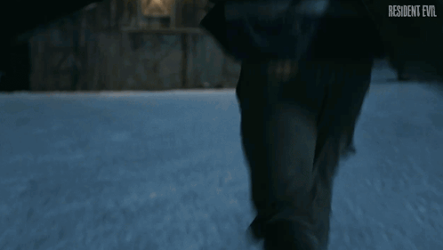 Man In Knitted Hat In Front Of House Resident Evil GIF