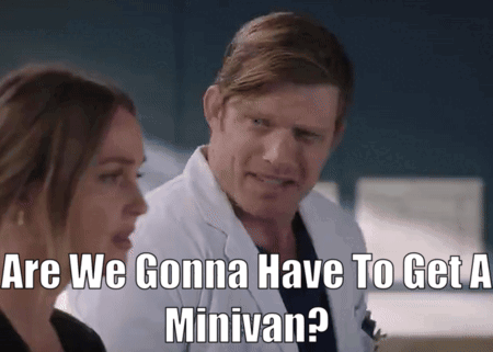 Man in Lab Coat Asking About Minivan