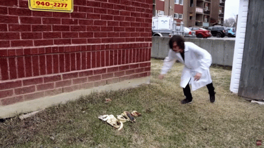 Man In Lab Coat Body Slam On Ground GIF