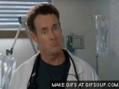 Man in Lab Coat Making Funny Face