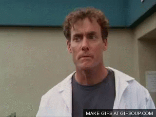 Man in Lab Coat Making Funny Face
