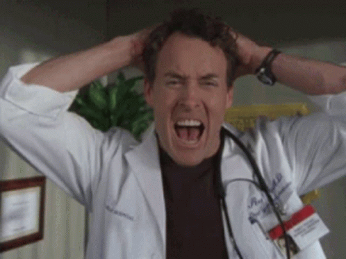 Man in Lab Coat Screaming