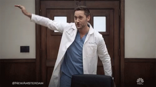Man in Lab Coat Standing in Front of Door #NewAmsterdam