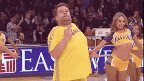 Man In Lakers Jersey Next To Cheerleader GIF