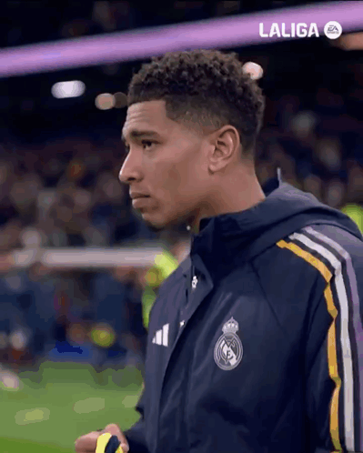 Man in Laliga Jacket on Field