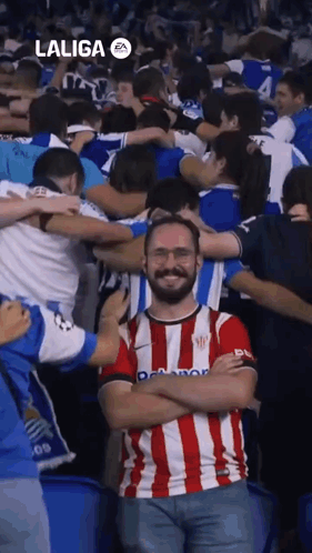Man in Laliga Shirt Standing in Crowd