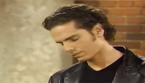 Man in Leather Jacket and Black Shirt
