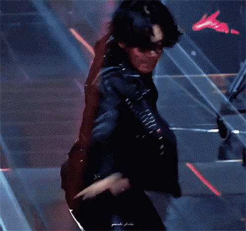 Man in Leather Jacket and Pants Dancing