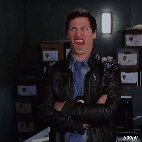 Man in Leather Jacket and Tie Smiling