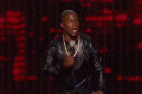 Man In Leather Jacket Dancing On Stage GIF