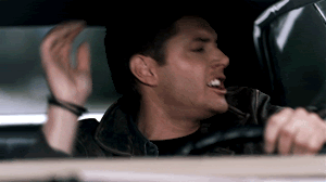 Man In Leather Jacket Driving Car GIF