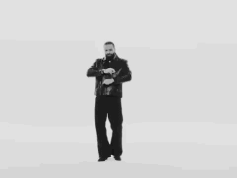 Man in Leather Jacket in Black and White Photo