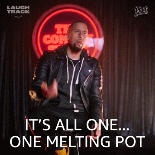 Man in Leather Jacket Sitting in Front of It's All One Melting Pot Sign