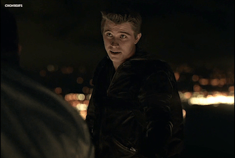 Man In Leather Jacket Talking To Another GIF
