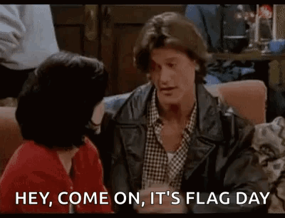 Man In Leather Jacket Talking To Woman GIF