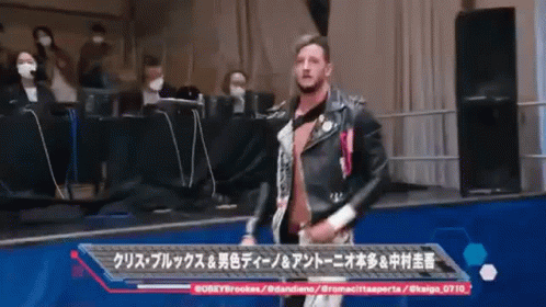 Man in Leather Jacket Walking Stage