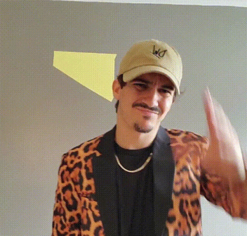 Man in Leopard Print Jacket and WD Hat