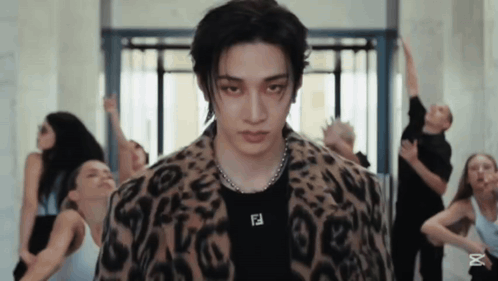 Man in Leopard Print Jacket with Fendi Necklace