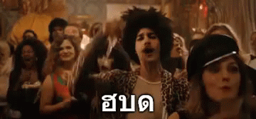 Man in Leopard Print Shirt Dancing at Party
