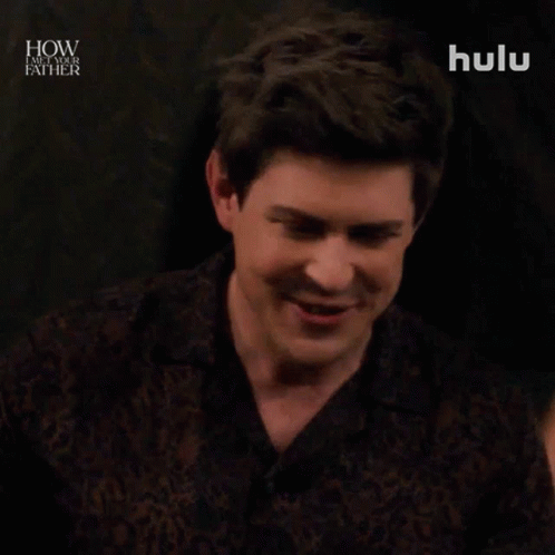 Man In Leopard Print Shirt Smiling Saying Cool GIF