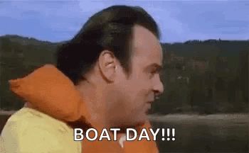 Man In Life Jacket On Boat Saying Boat Day GIF