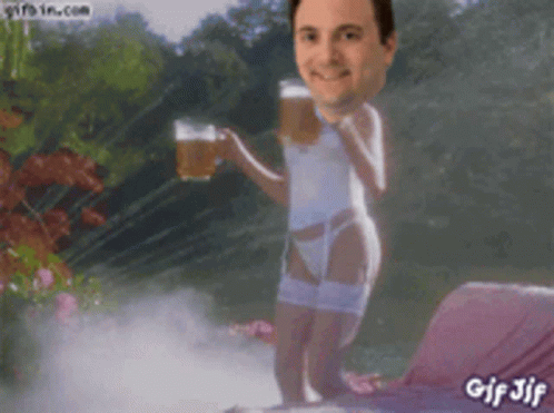 Man in Lingerie Holding Beer