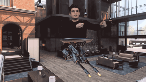 Man in Living Room With Flying Robot