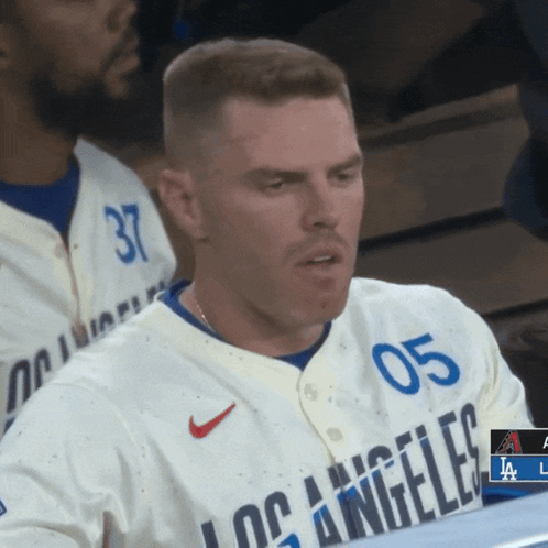 Man in Los Angeles Jersey Sitting