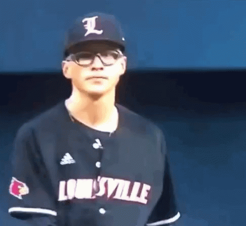 Man in Louisville Jersey and Hat