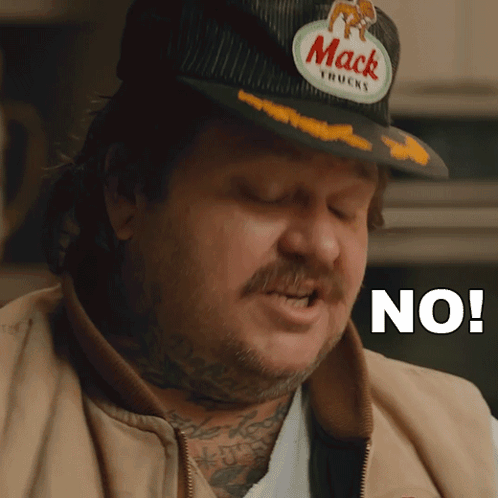 Man in Mack Truck Hat Saying No
