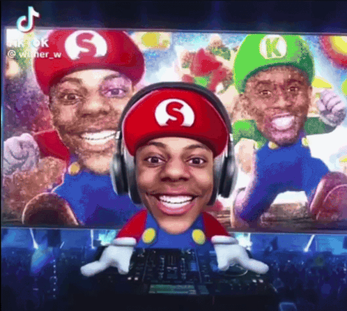 Man in Mario Hat Wearing Headphones Smiling