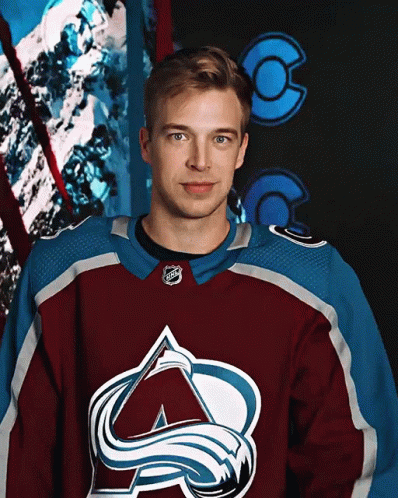 Man in Maroon and Blue Jersey