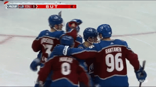 Man in Maroon and Blue Jersey Number 9