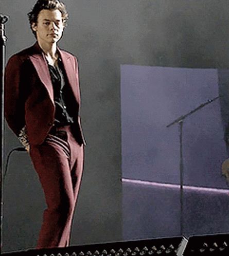 Man In Maroon Suit At Microphone GIF
