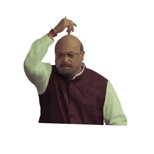 Man in Maroon Vest With Letter K