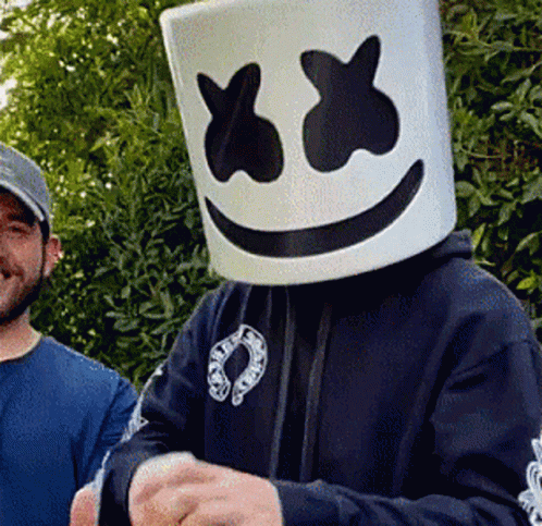 Man In Marshmello Mask Beside Another Man GIF